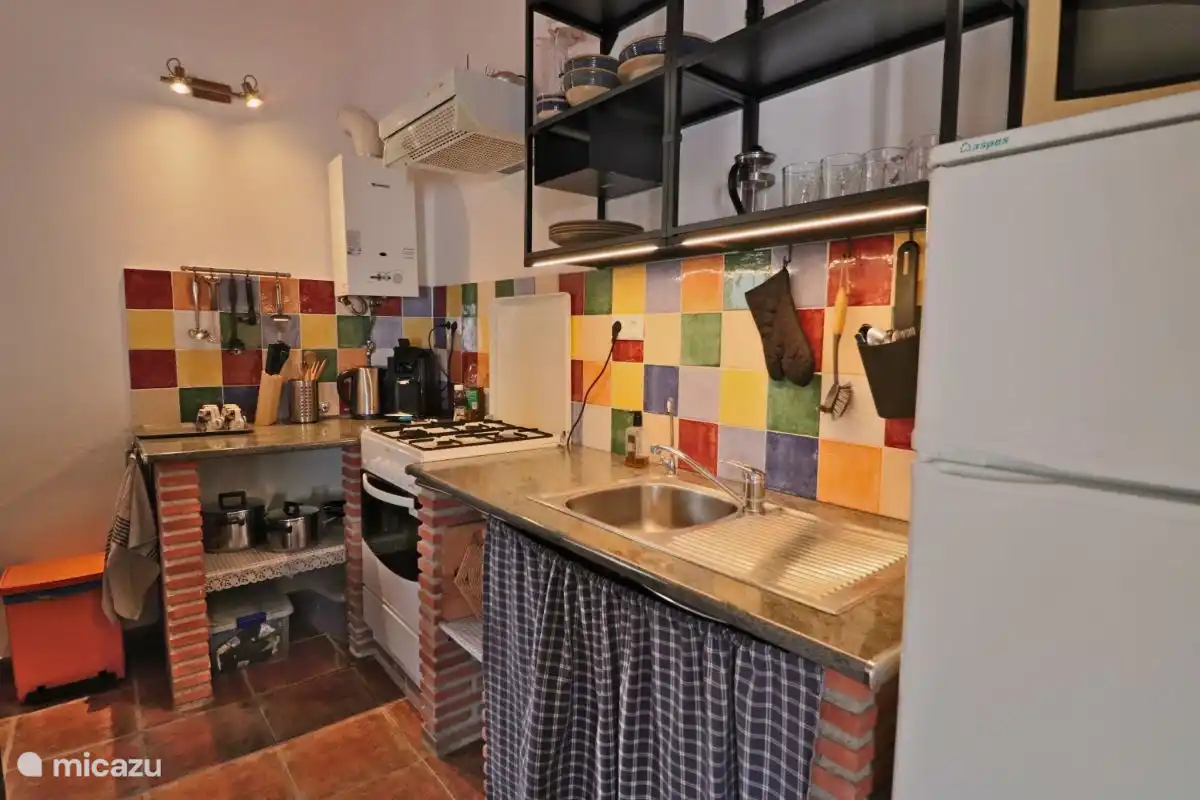 The kitchen is fully equipped