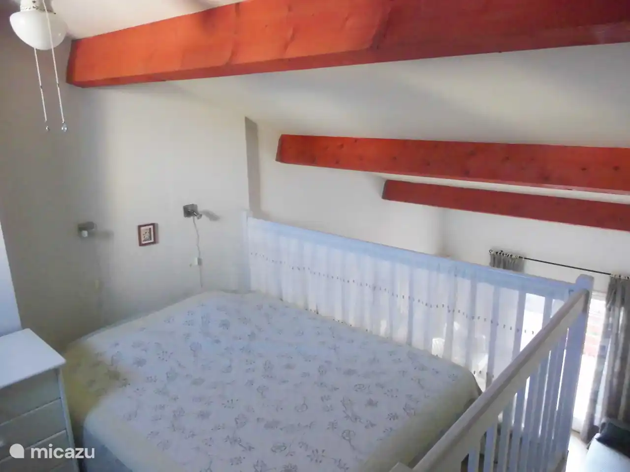 bedroom on mezzanine with double bed