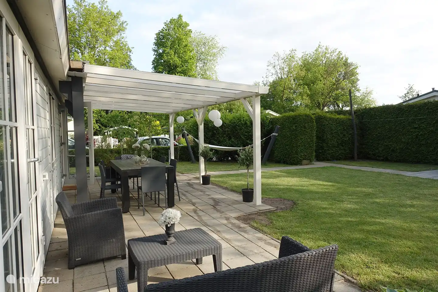 4 persoons Chalet de Berk, Rheezerveen. Terras en tuin 