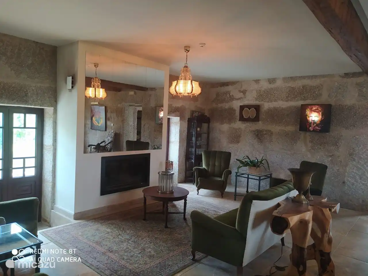 Wohnzimmer, Sitzecke um den Rekuperador / Kamin