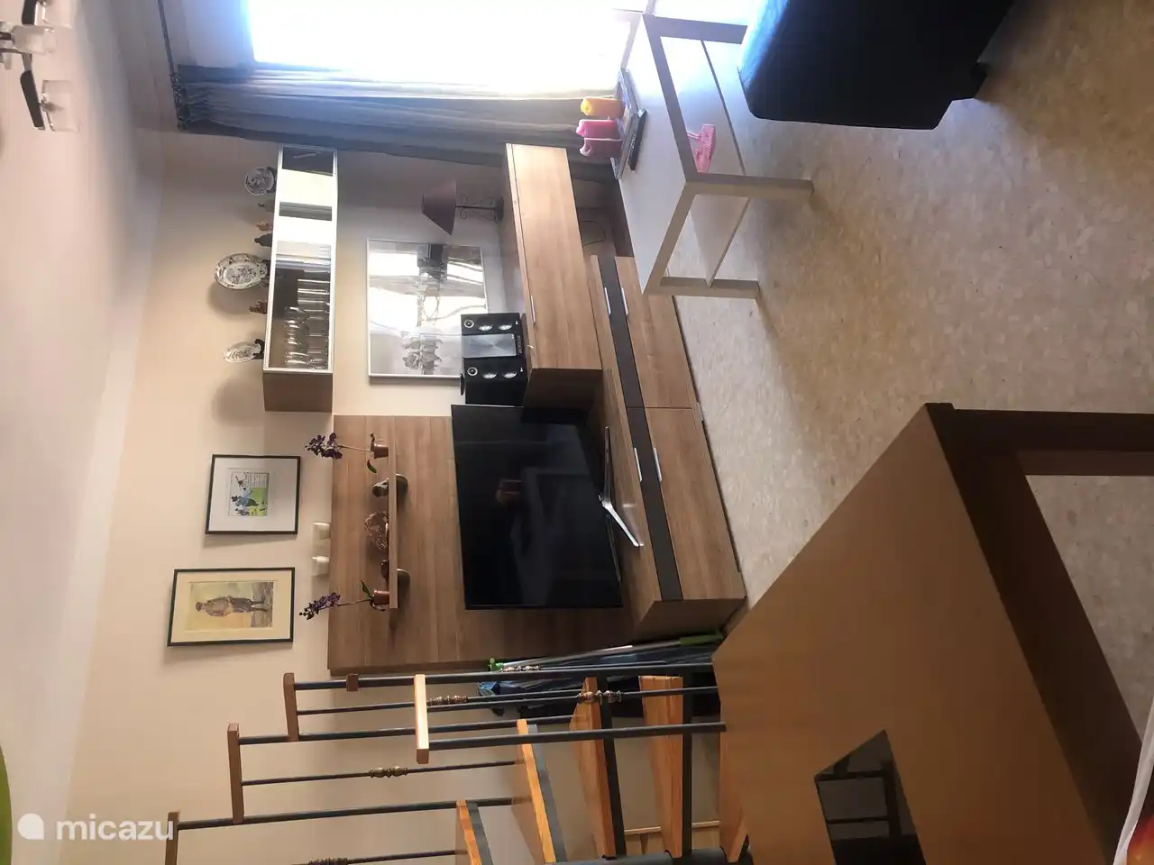 The lovely roof terrace can be reached via the spiral staircase in the living room