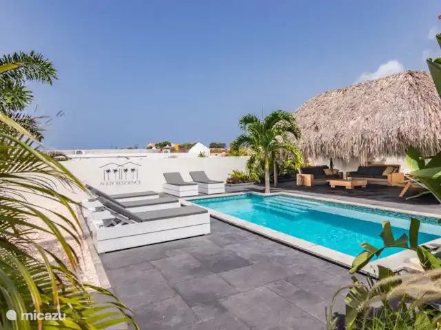 N Joy Residence Curaçao | Curaçao, Banda Ariba (est), Brakkeput Abou - appartement La piscine et la palapa communes