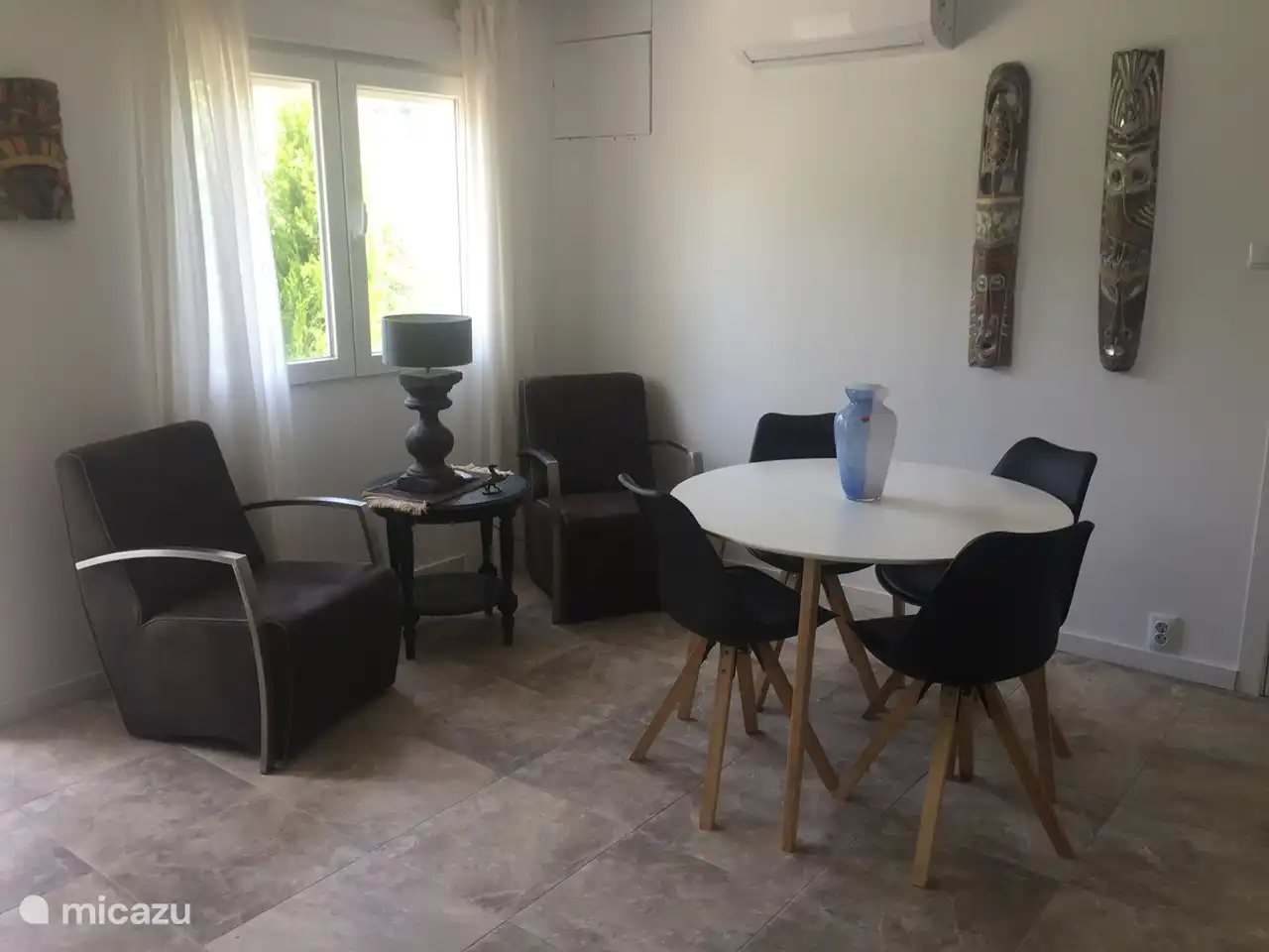 A lovely seat for drinking a cup of coffee in the morning or to read a good book, for example