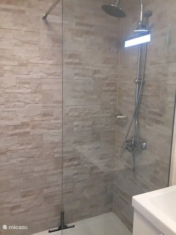 Luxury shower with 2 nozzles.