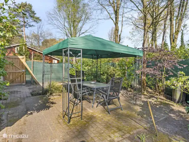 't Boshuis | Pays-Bas, Brabant-Septentrional, Baarle-Nassau - bungalow Coin salon à côté de la cuisine à la porte du jardin