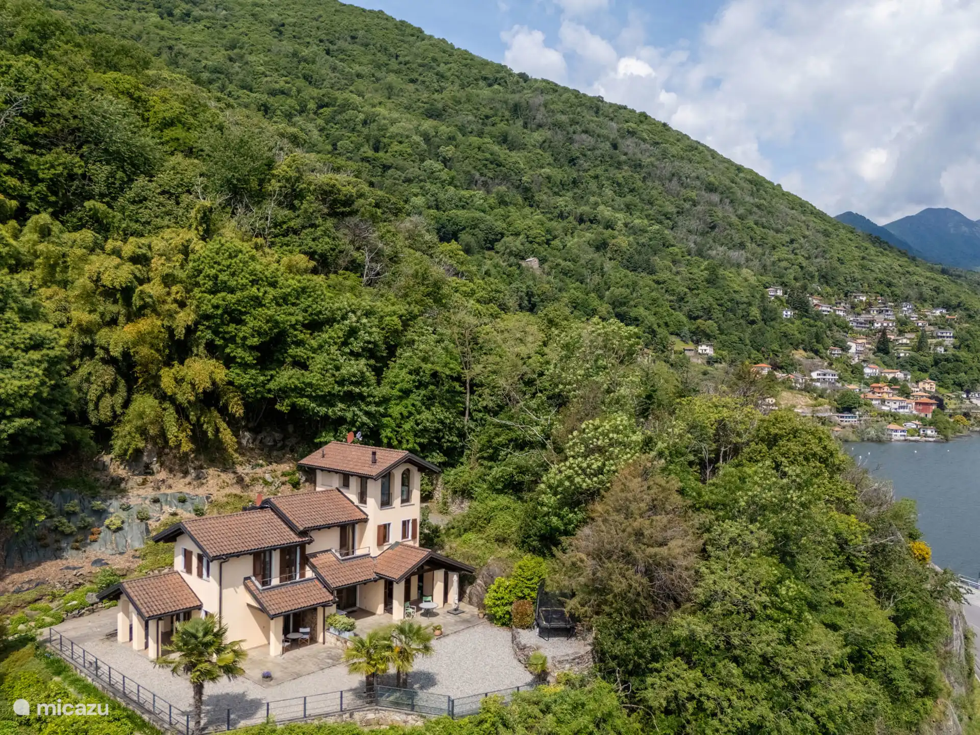 aerial view of our houses with terraces and on the right a piece of Lake Maggiore