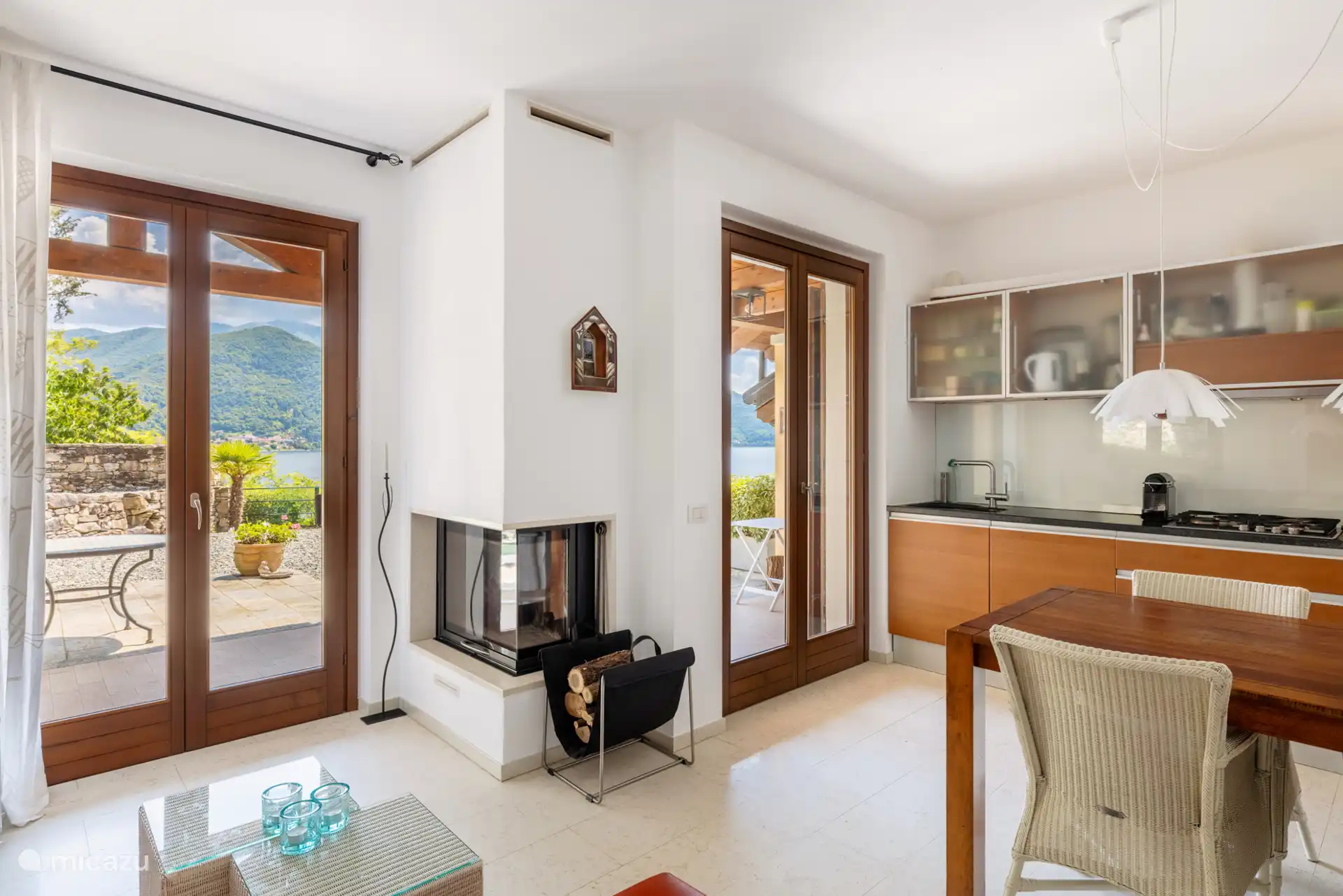 from the living room you have a beautiful view of the terrace, garden, and Lake Maggiore