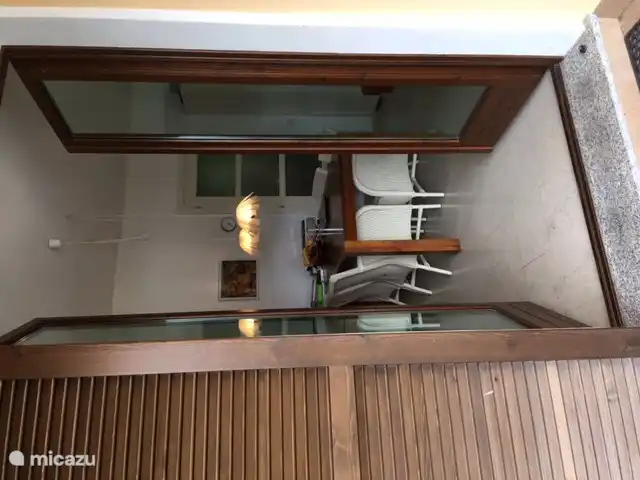 From the terrace with a lovely private porch through large patio doors to the living room with 2 funny &#39;Beatle lights&#39;