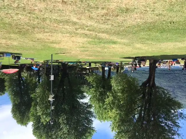 Cannobio beach with sunbathing lawn
