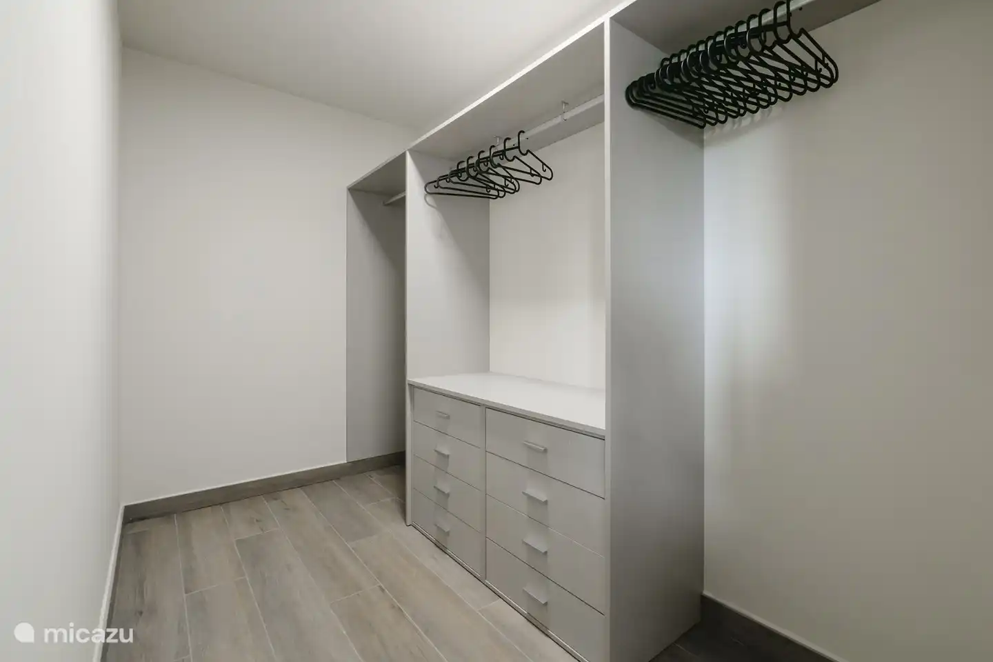 Beautifully spacious walk-in closet from the master bedroom.