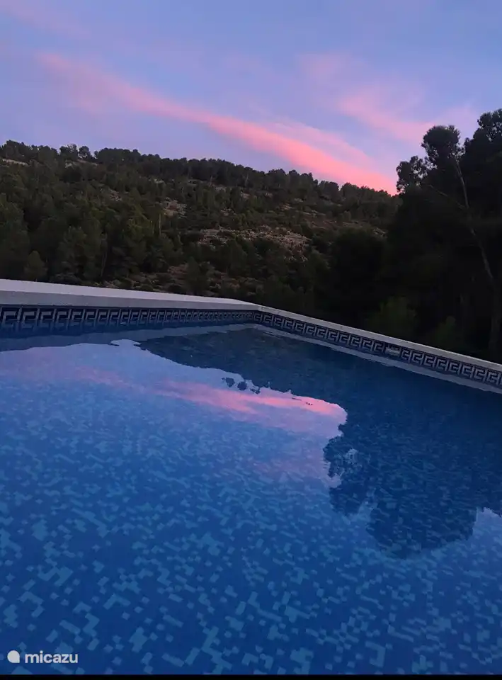 Schwimmen bei Sonnenuntergang