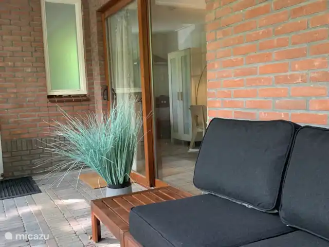 Maison forestière Nunspeet B40 | Pays-Bas, Gueldre, Nunspeet - maison de vacances Profitez de vous asseoir dehors avec des coussins confortables