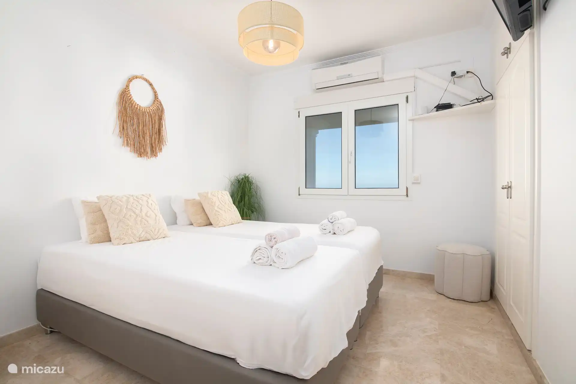 zwei Einzelbetten im Schlafzimmer 4