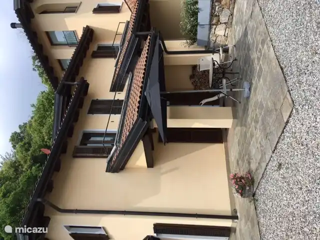 Terrace with seating and a view of Lake Maggiore