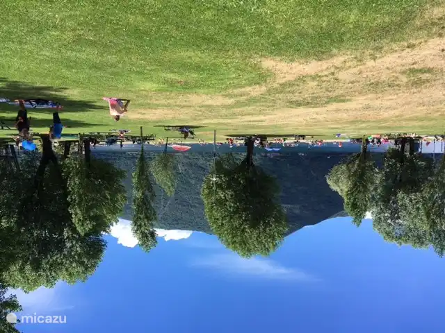 Cannobio beach with sunbathing lawn