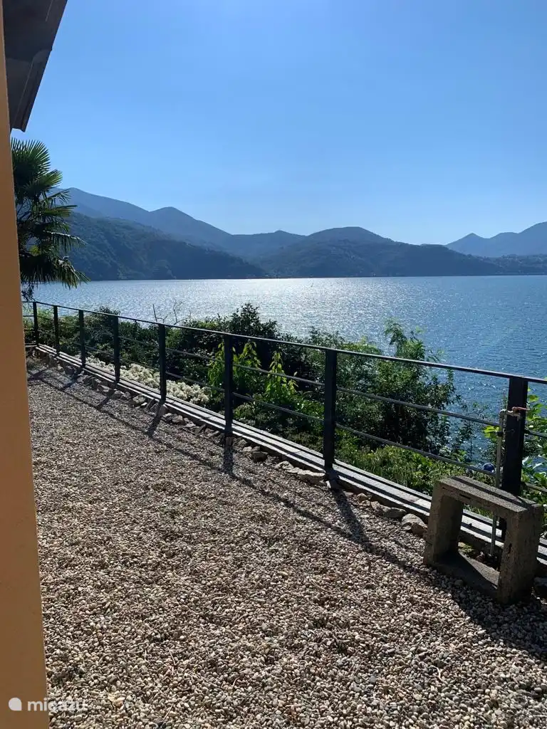 view from the terrace of Luino on the other side with the rising sun