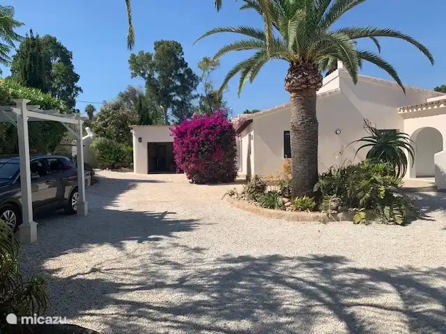 Front of the house with carport