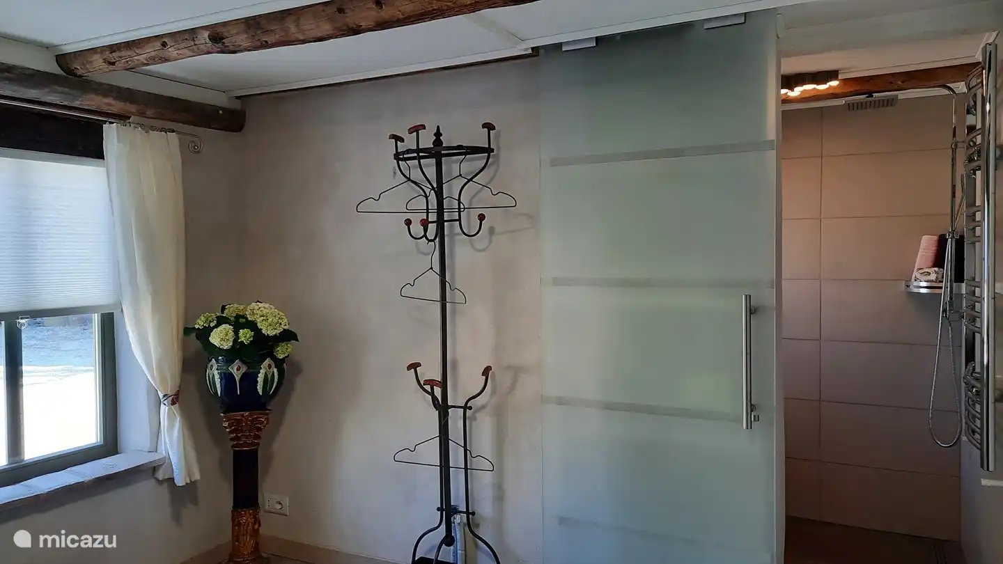 Sliding glass door En Suite bathroom of bedroom 2.