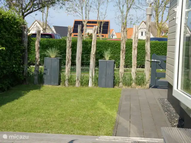 Chalet Zeeuws Vlaanderen en Países Bajos, Zelanda, Nieuwvliet-Bad - mobil home / caravana Jardín con amplia vista