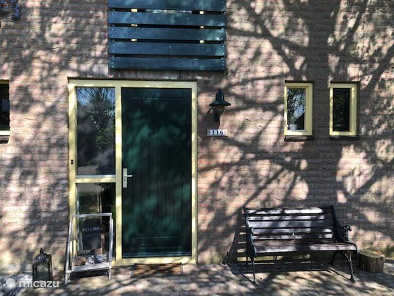 Casa vacacional Países Bajos, Güeldres, Ewijk Casa vacacional Preciosa casa, bañera de hidromasaje, jardín, pájaros.
