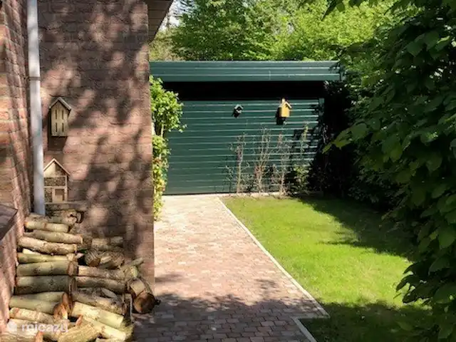 Preciosa casa, bañera de hidromasaje, jardín, pájaros. en Países Bajos, Güeldres, Ewijk - casa vacacional Cabaña de jardín lateral