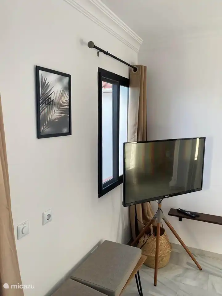 We have a SMART TV in the living room. You can easily log in to your own Netflix or YouTube account.