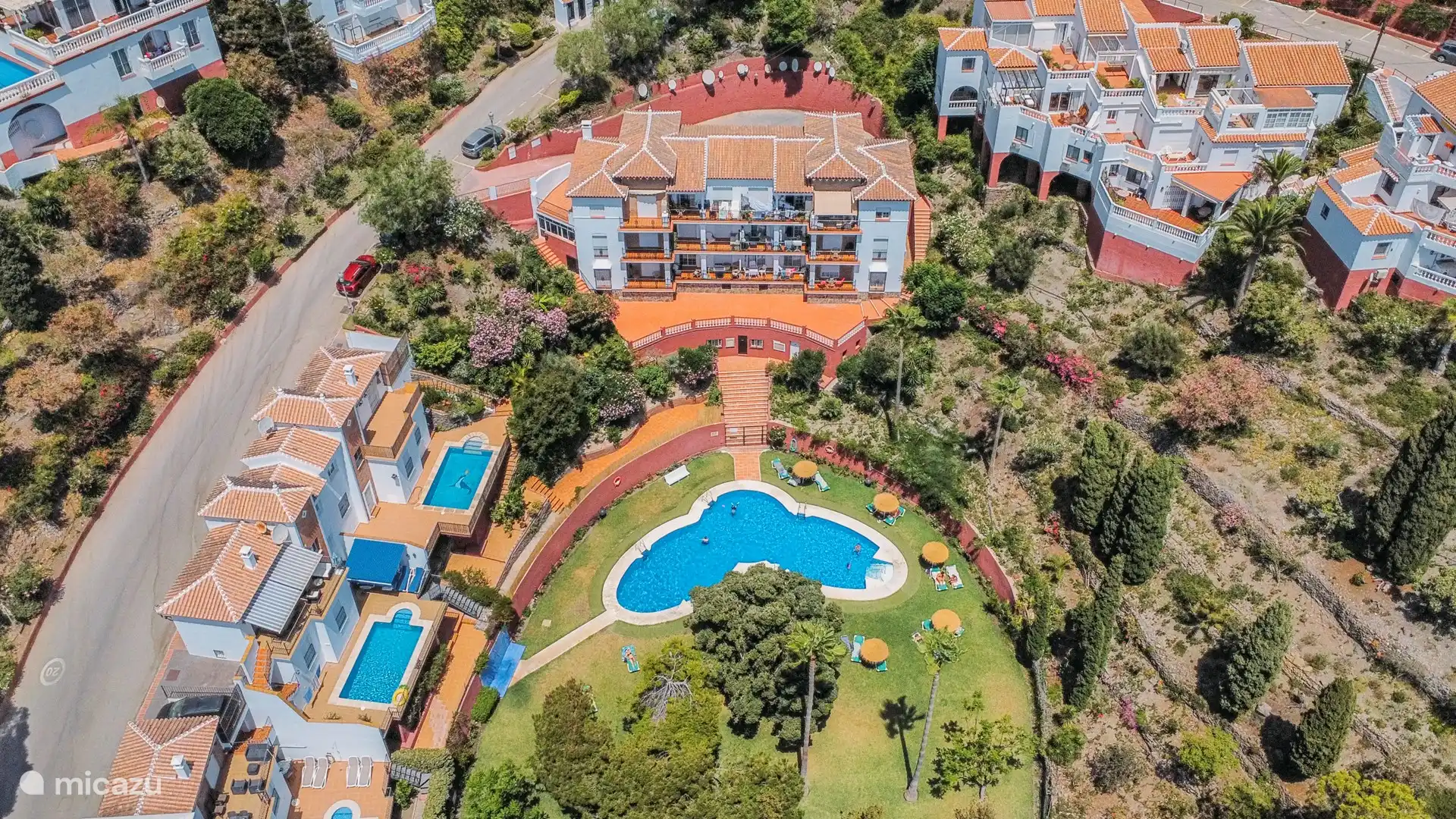 Refreshing dip in the pool just a few steps away.