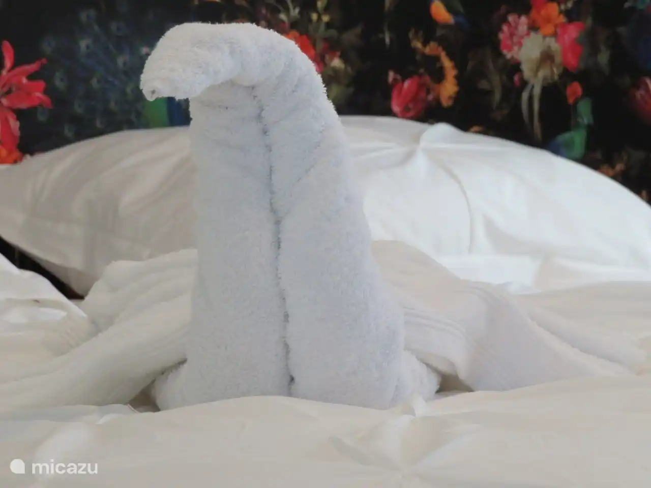 A towel set (bath towel and hand towel) is provided per guest.