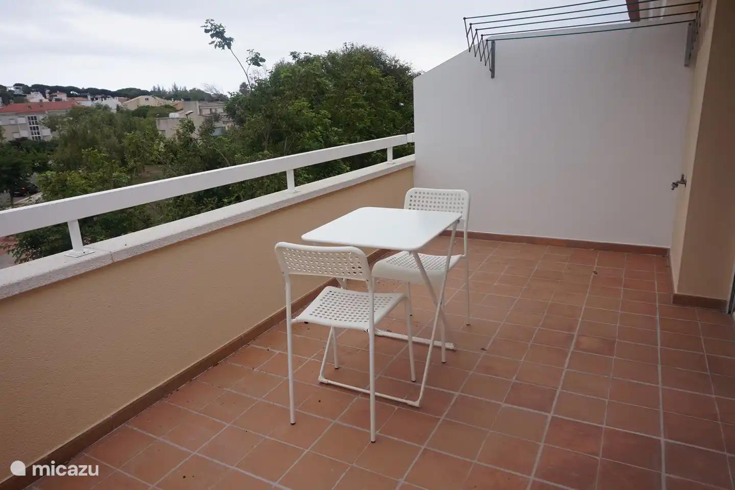 Terrasse sur le toit avec étendoir