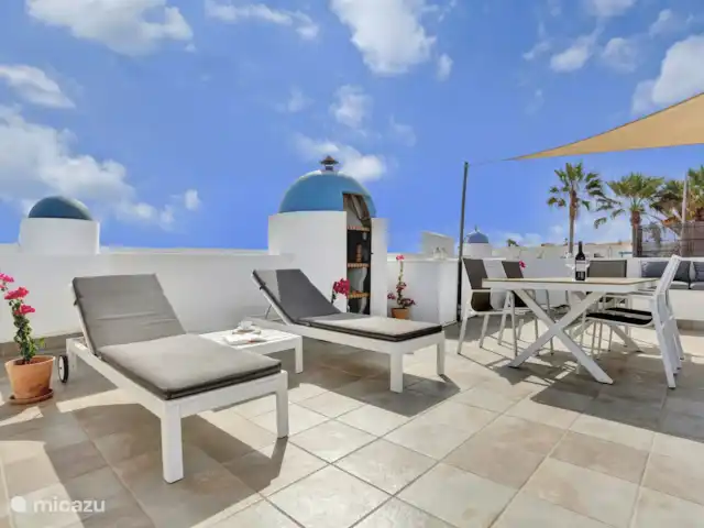 bungaló en España, Fuerteventura, Corralejo – Brisa del Mar Fuerteventura La gran terraza de la azotea es ideal para tomar el sol o disfrutar de la brisa marina