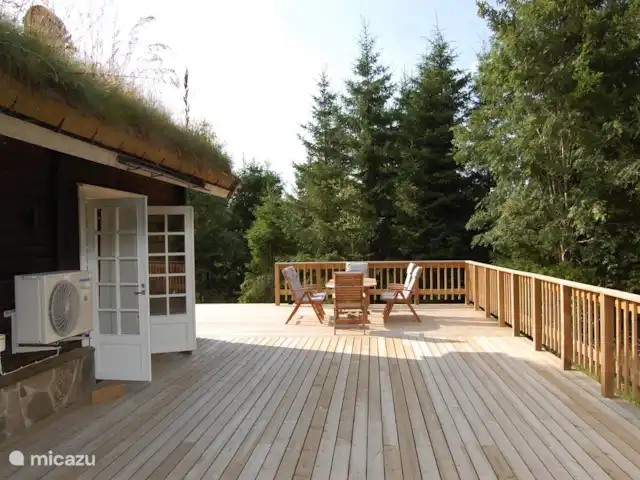 Latitude | Suède, Västergötland, Torestorp - cabane en bois / lodge terrasse à l'arrière