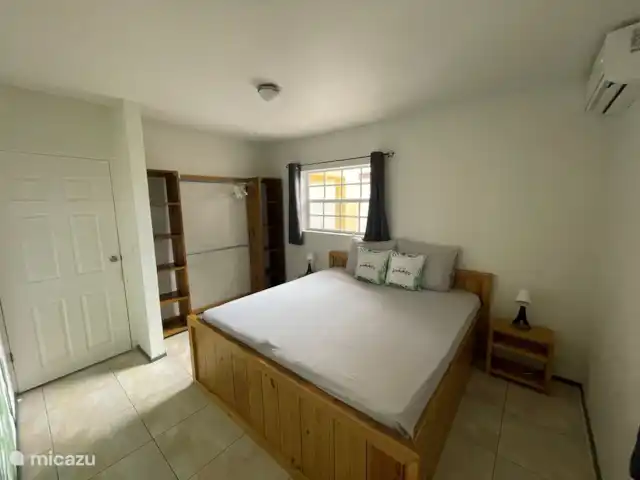 Villa confortable avec piscine privée | Curaçao, Banda Ariba (est), Seru Bottelier - villa La chambre 1 a un lit double.