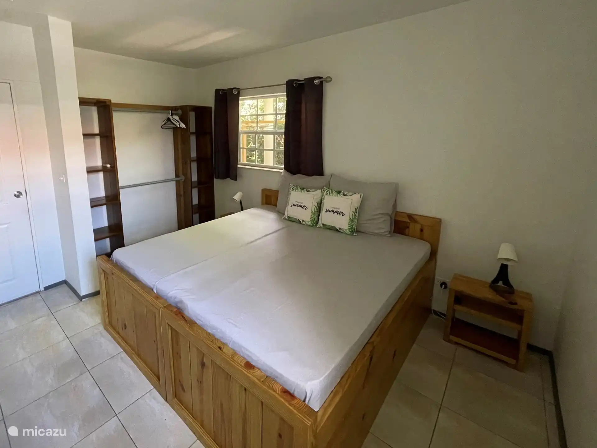 Bedroom 3 has two single beds.