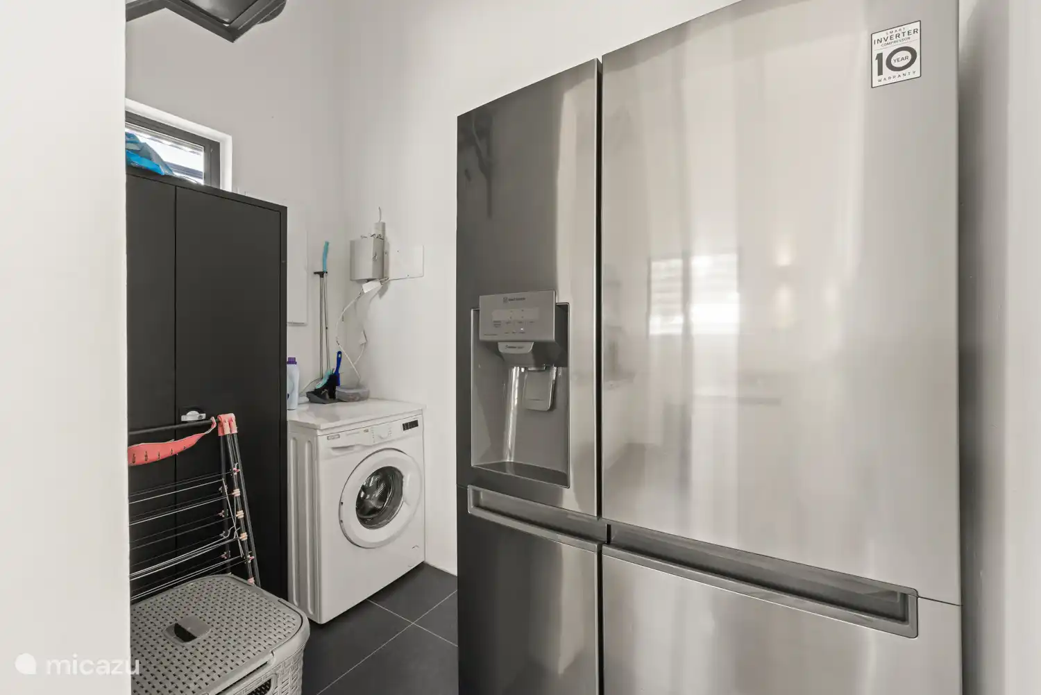 Waschküche und amerikanischer Kühlschrank