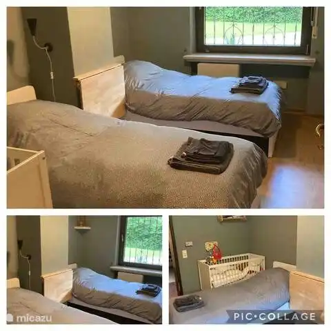 Chambre 1 avec 2 lits simples et un lit bébé