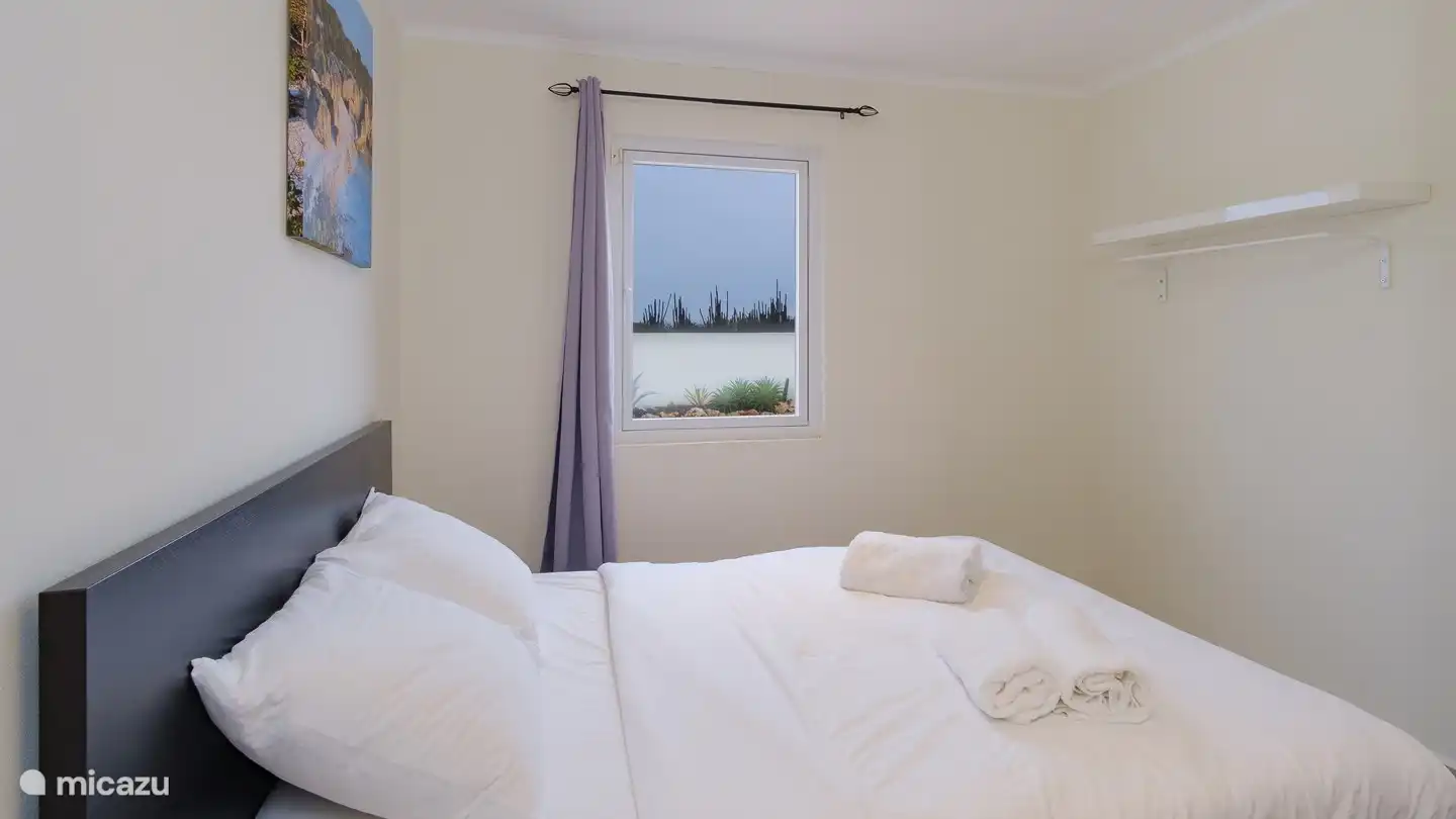 2. Schlafzimmer mit Meerblick (Queensize-Bett)