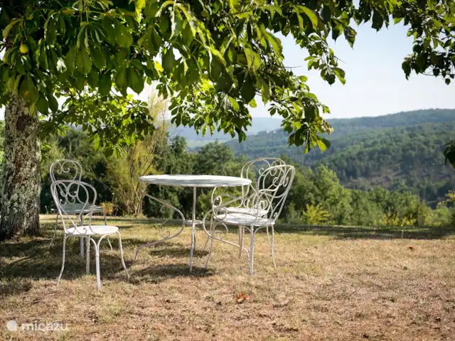 Location de Vacances France, Lot, Grezels, maison de vacances - Sirepêche Un siège avec une belle vue