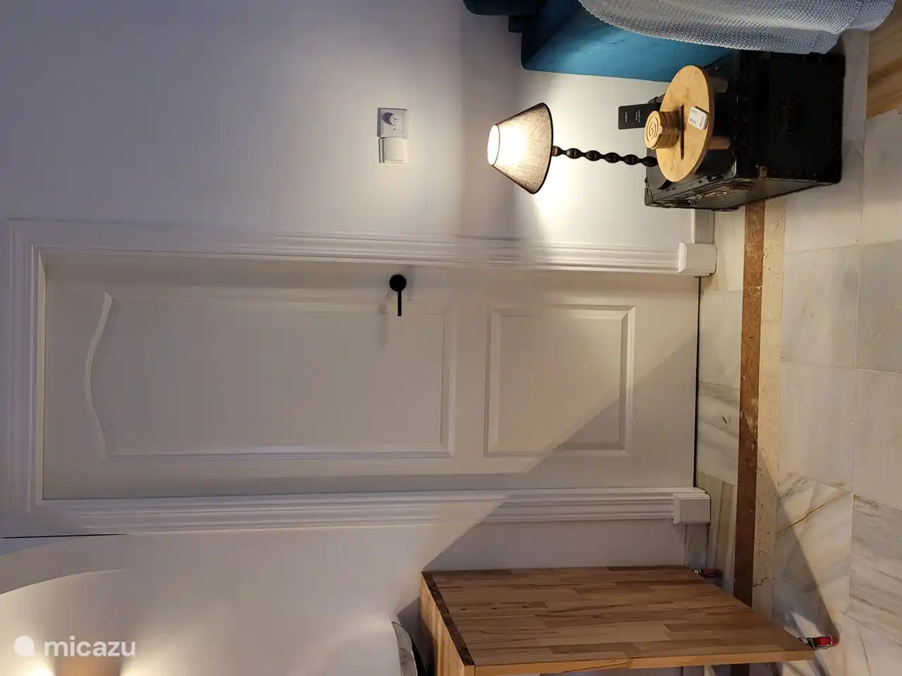 Die Tür zum Schlafzimmer mit eigenem Bad.