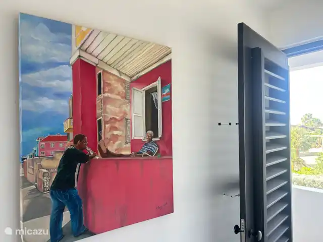 Blue Bay Penthouse REEF 5 OCEAN VIEW huren in Curaçao, Curacao-Midden, Willemstad - appartement entree met lokale kunst