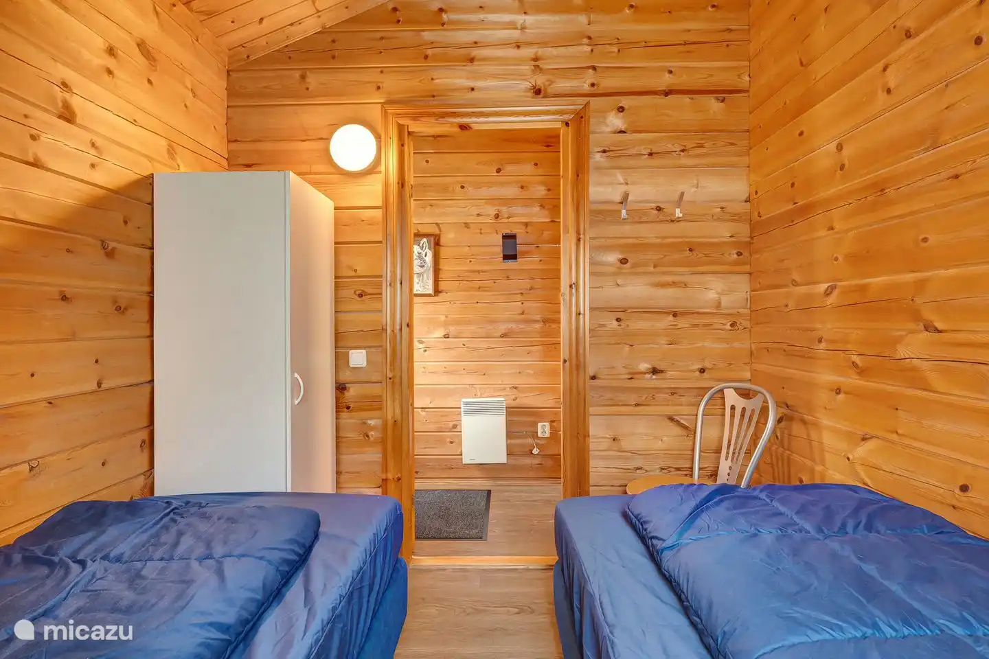 Chambre avec 2 lits de luxe à sommier
