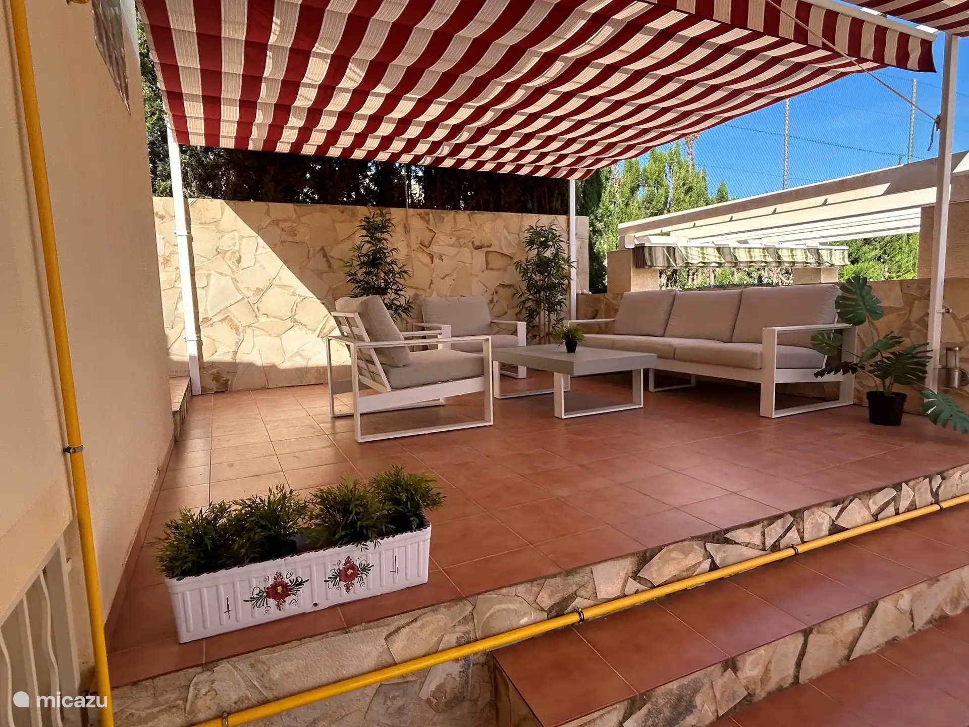 lounge set outside under awning