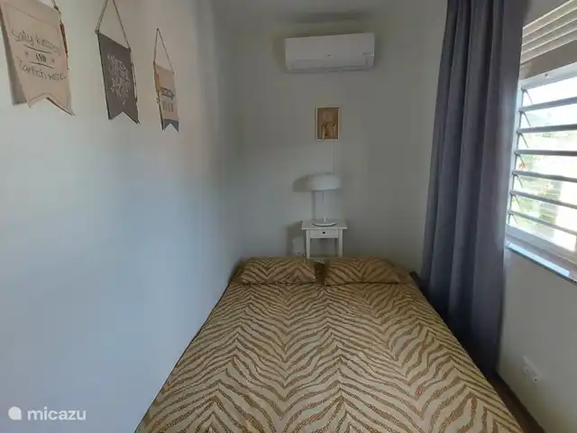 BlijeRust Penthouse Curadise | Curaçao, Curaçao-Centre, Blue Bay - appartement La deuxième chambre dispose de deux lits jumeaux.