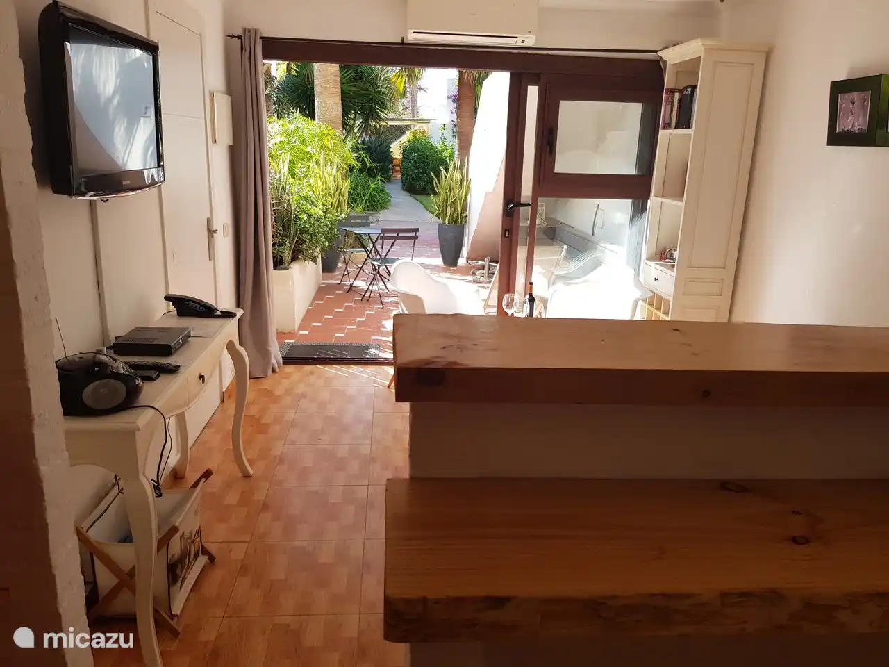 Aufwachen mit Blick auf den Palmenplatz