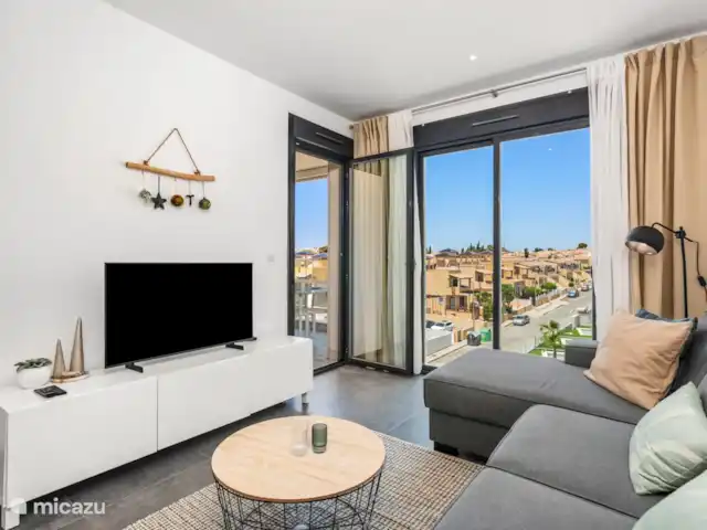 Location de Vacances Espagne, Costa Blanca, Villamartin, penthouse - Palmera Penthouse, Valentino Golf I Salon avec TV : chaînes internationales et chromecast.