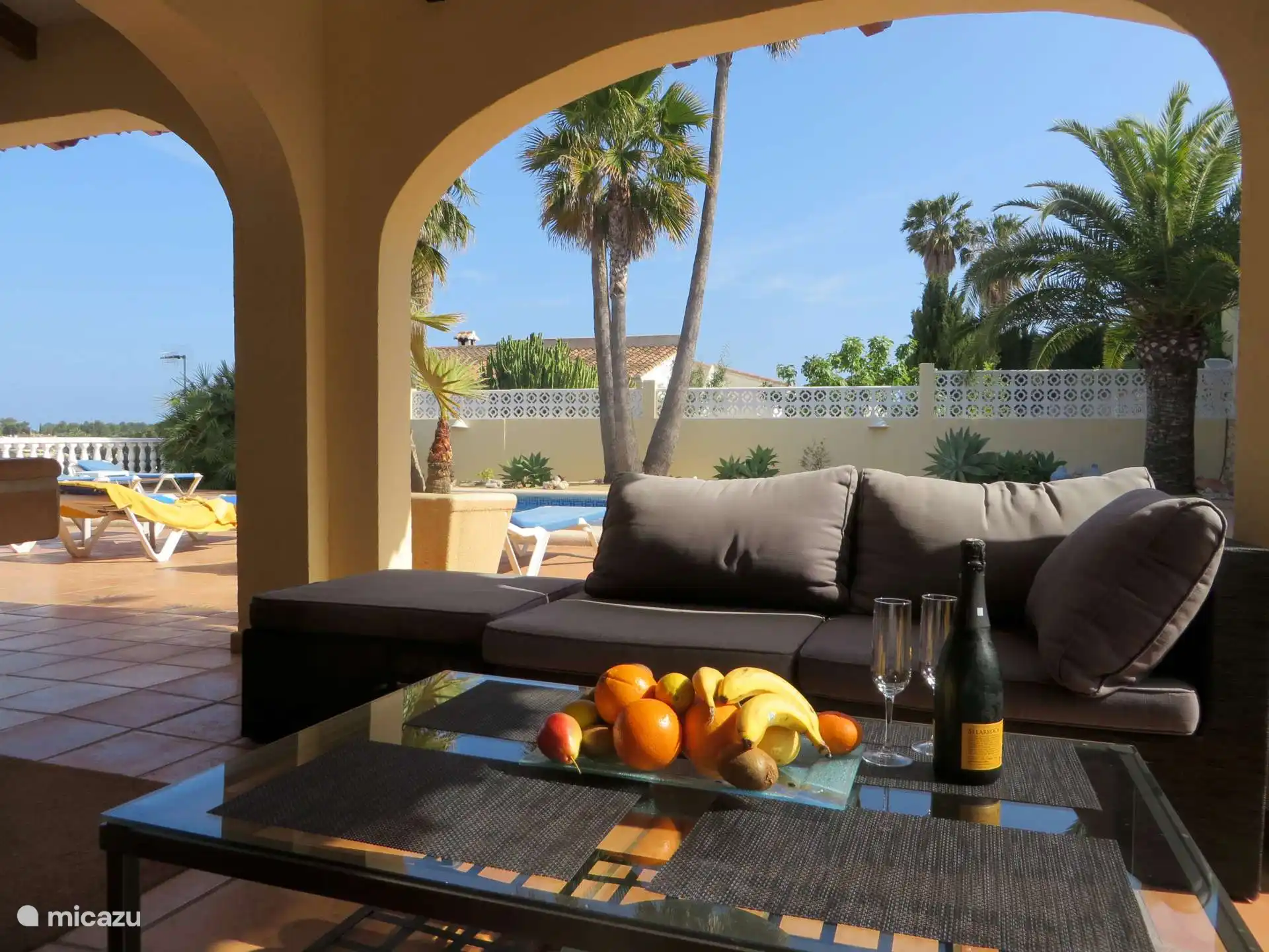 View from lounge on terrace, pool and garden