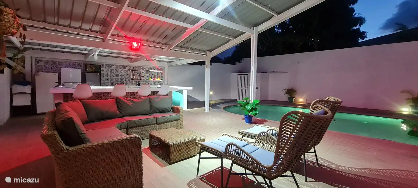 Cozy Backyard with a large pool, bar, grill and patio.