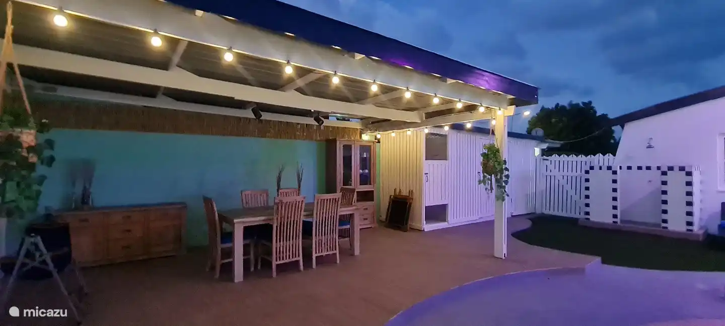 Cozy Backyard with a large pool, bar, grill and patio.