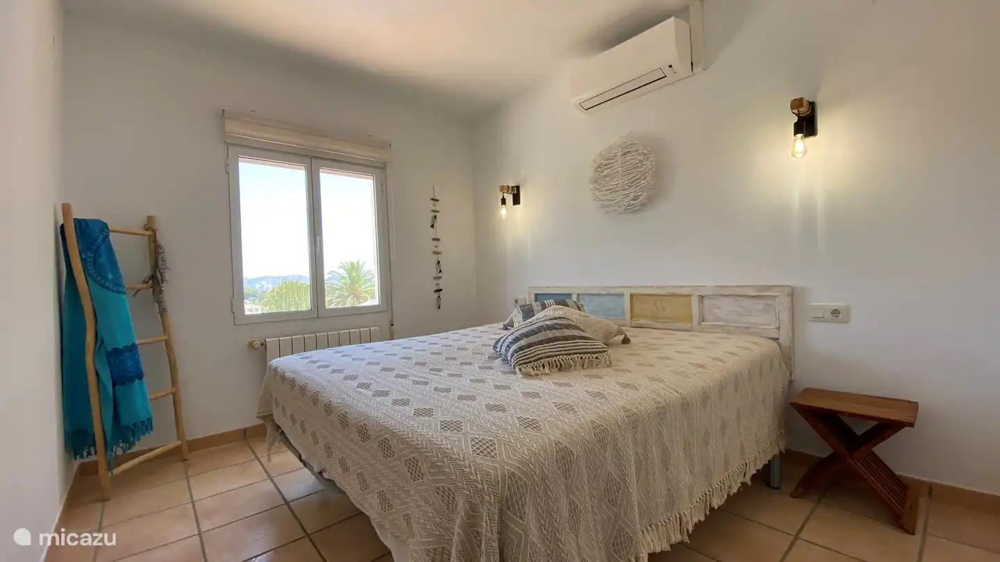 Room 2 upstairs. Double bed or 2 single. Air conditioning and small dressing. beautiful view over swimming pool