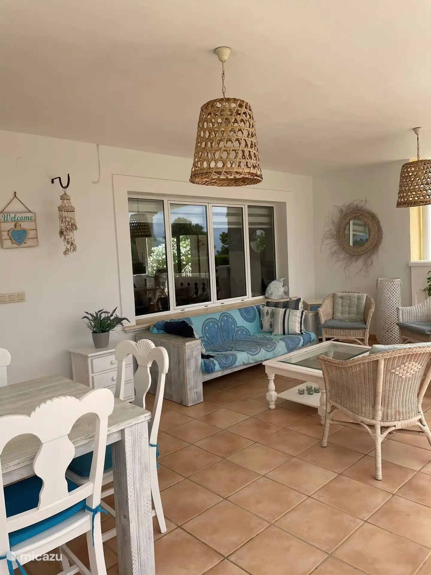 Nice spacious terrace with BBQ at the front of the house.