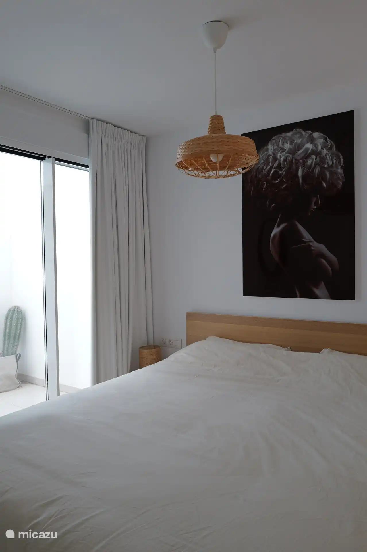 Slaapkamer 2 geeft direct toegang tot de patio. 